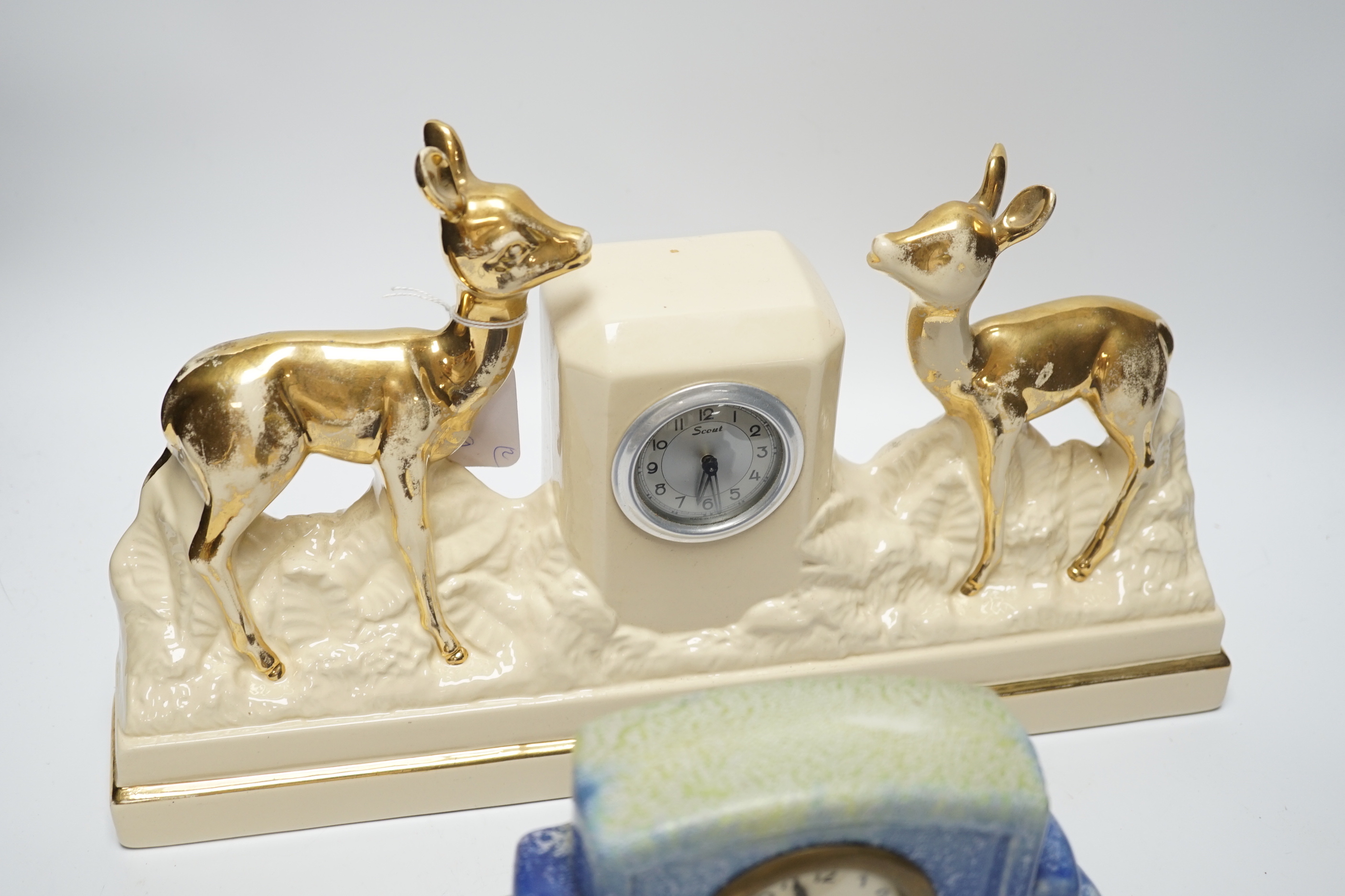 Two French ceramic mantel timepieces, largest 40cm wide